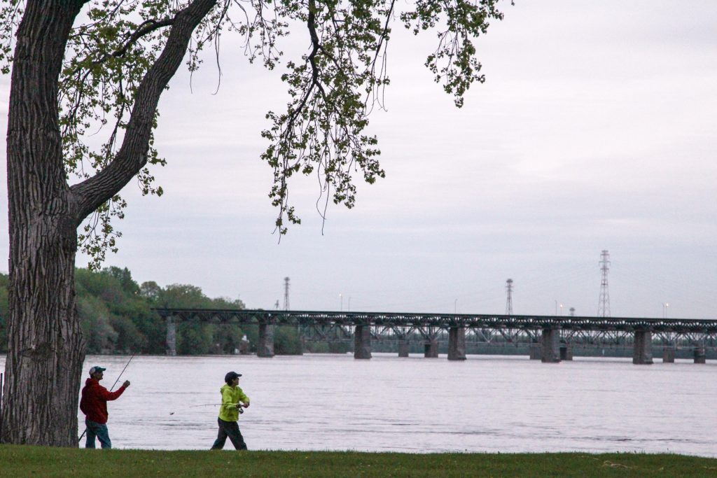 Family fishing at the Lachine Sculpture Park